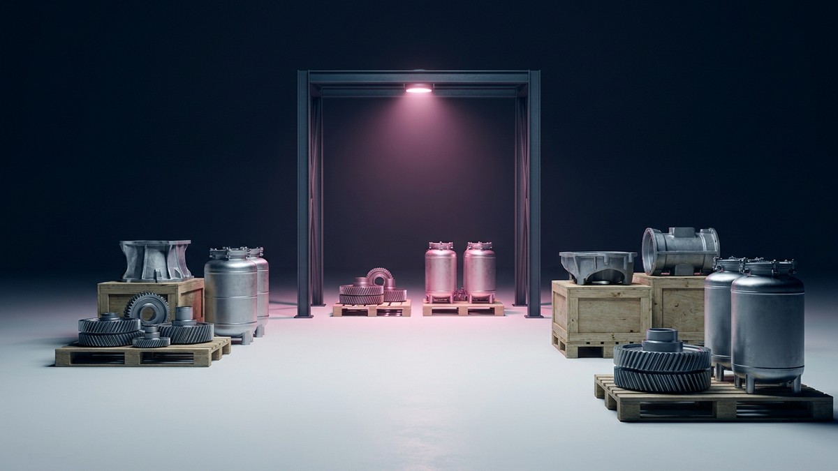 Unbranded chemical vessels and automotive components approach a single illuminated inspection arch